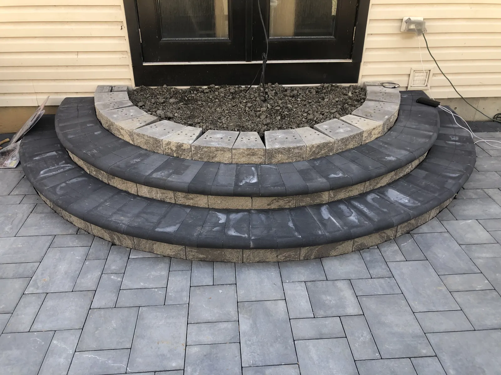 Front Entry Paver Steps by Down To Earth Landscaping.