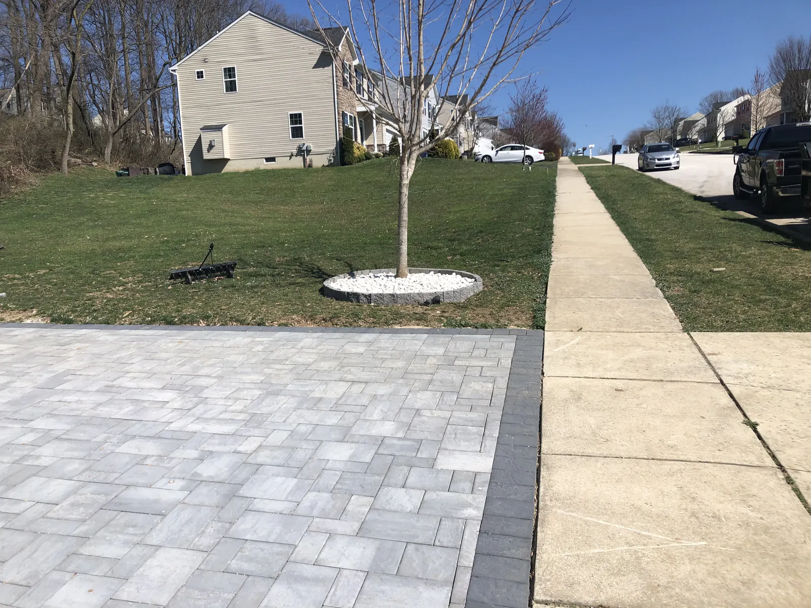 Front Walkway Paver Border by Down To Earth Landscaping.