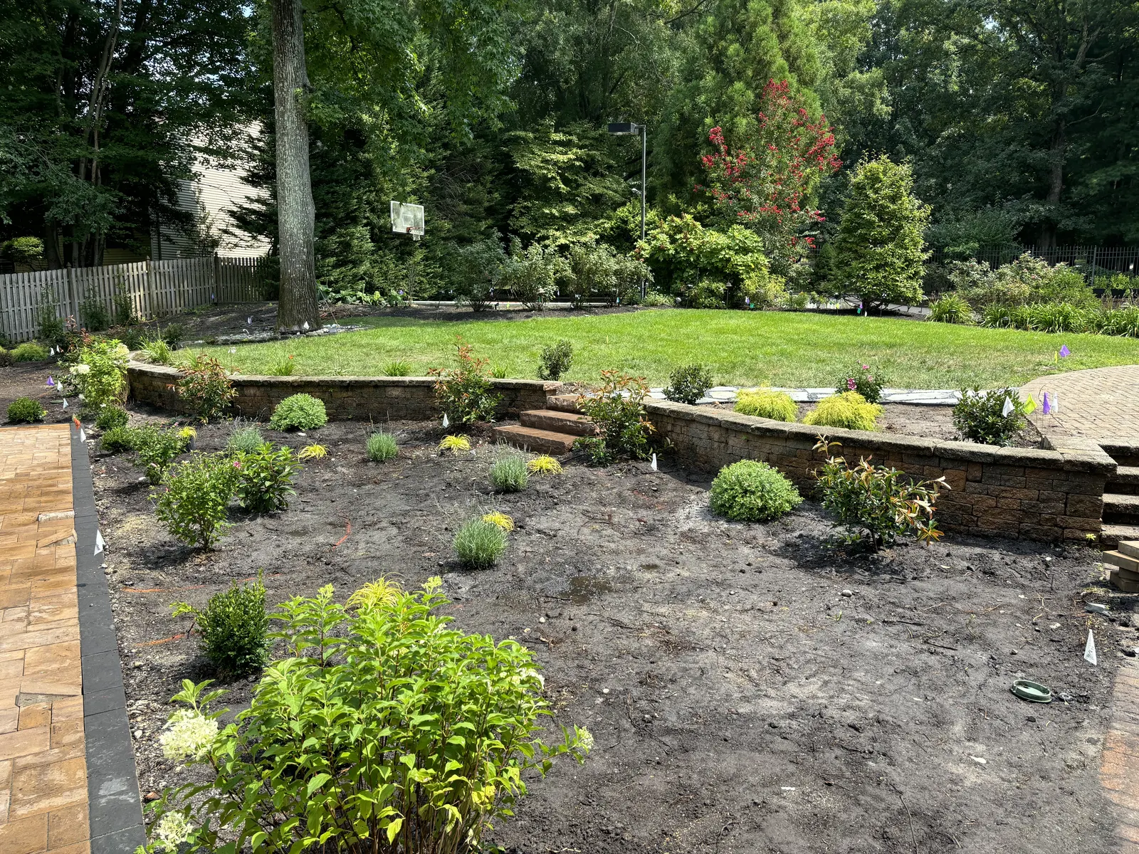 Backyard Garden Installation by Down To Earth Landscaping.