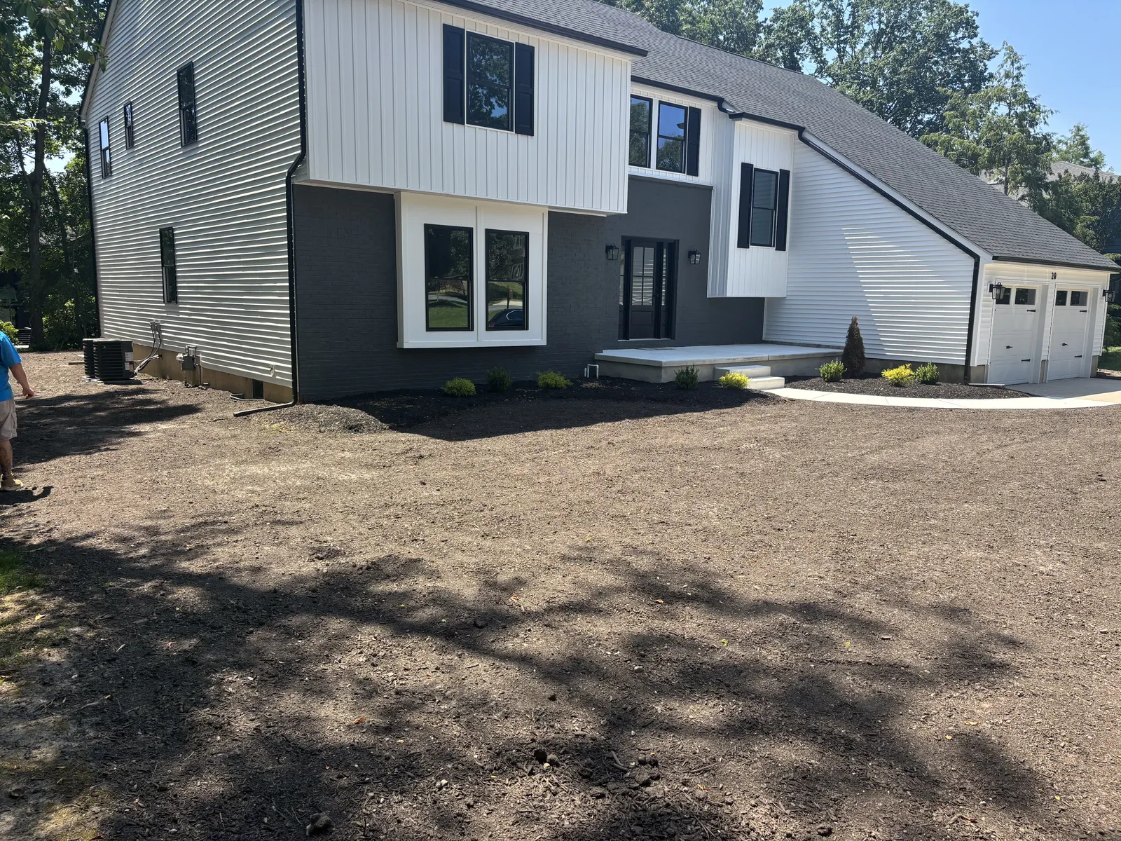 Front Yard Grading Finished by Down To Earth Landscaping.
