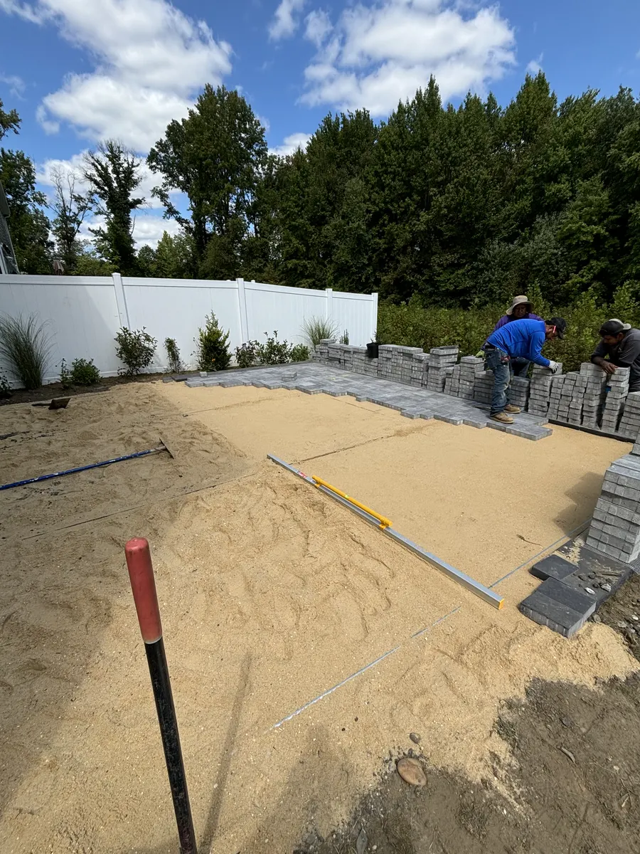 Patio Base Preparation by Down To Earth Landscaping.