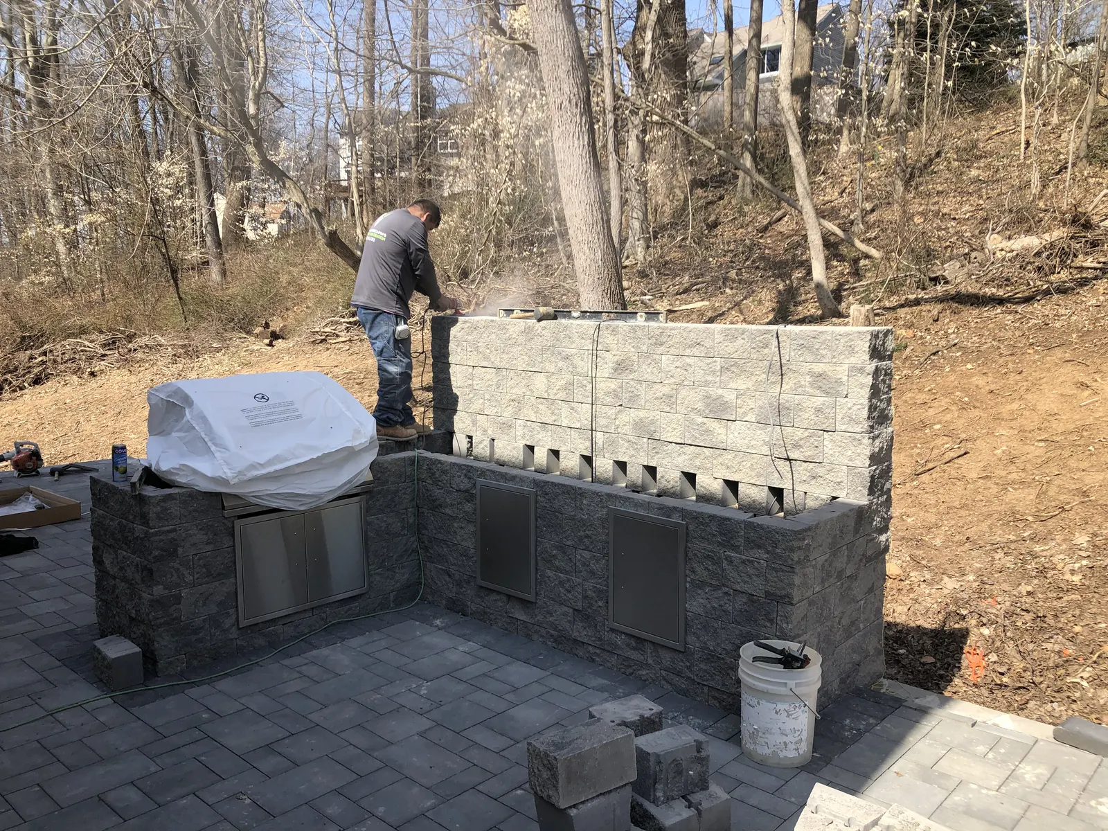 Outdoor Kitchen Stonework by Down To Earth Landscaping.