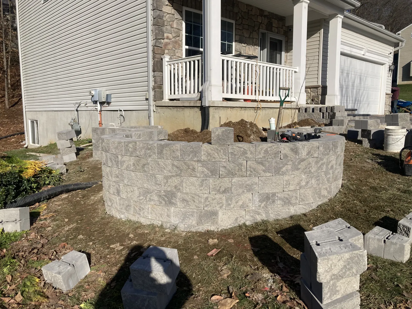 Raised Wall Front Bed Before by Down To Earth Landscaping.