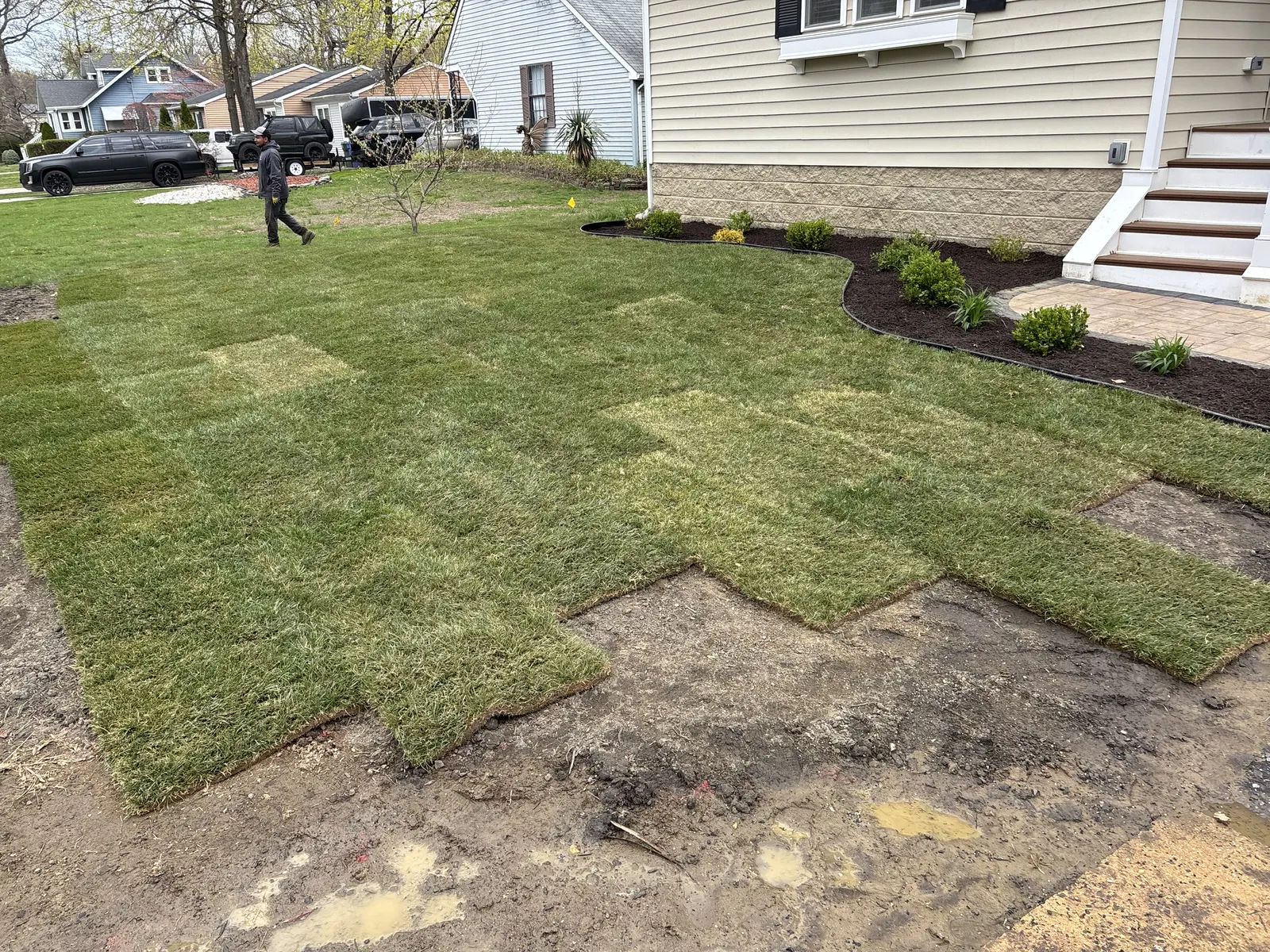 Backyard Sod Installation by Down To Earth Landscaping.