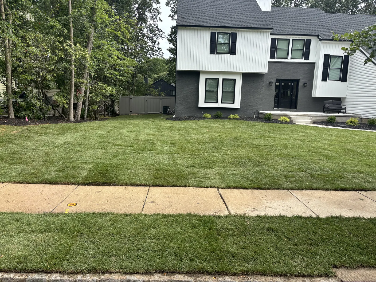 Front Yard Sod Finished by Down To Earth Landscaping.